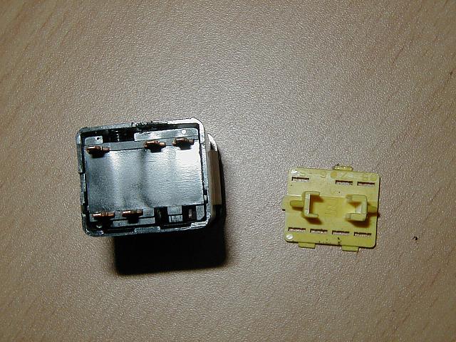 Pull the yellow piece off.