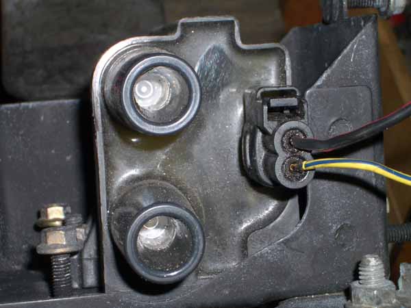 Old FD Coil.  The Black/Red wire is the (+).  Yellow/Black is (-)