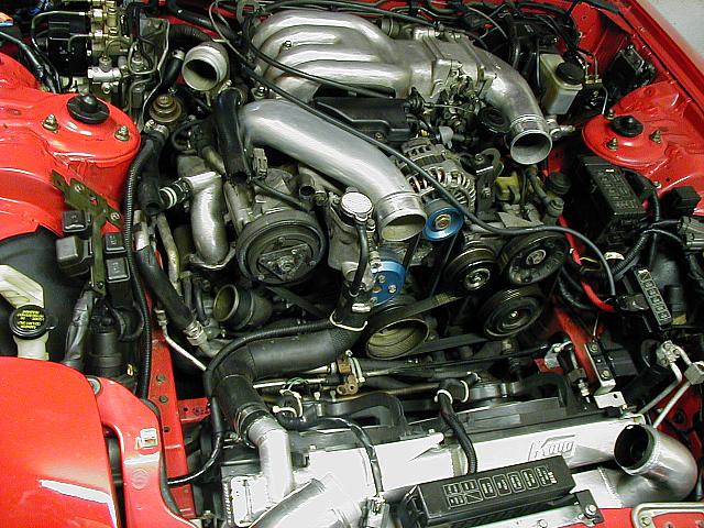 The beginning of the end... of the twins.  Intake and piping comes off.