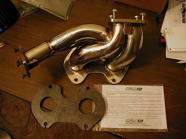 Originally I bought an OBX manifold off of eBay and a 1/2" flange from mazdatrix to use as a spacer between the manifold an