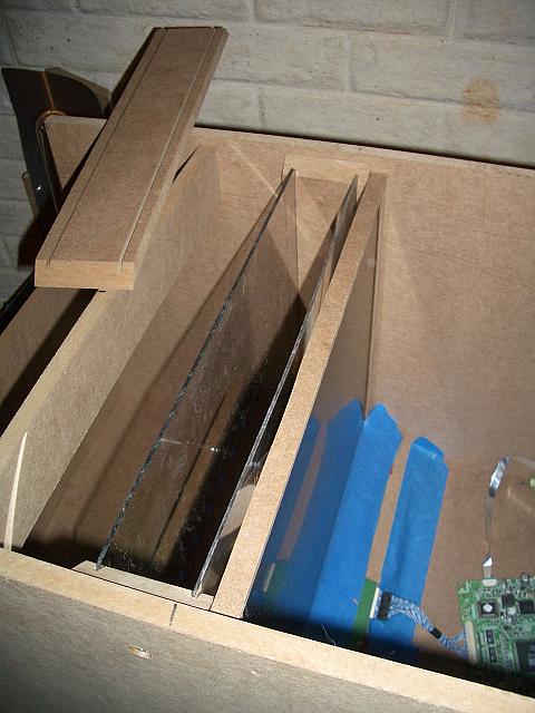 Two slots, the first for UV lexan and the second for the first fresnel.  (to the left is the top cover.)  LCD mount is attached 