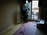 Hammering in planks.