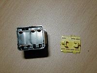 Pull the yellow piece off.