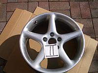 Wheel 2.  It's bent and has a chunk missing.  I used this one to test a few paints.  Before buying a new set of wheels my plan w