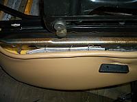 I strung a coathanger through the 2 holes and hog-ringed it to the hanger.