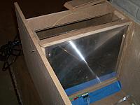 The front fresnel is mounted at the top, for "gravity keystone adjustment."